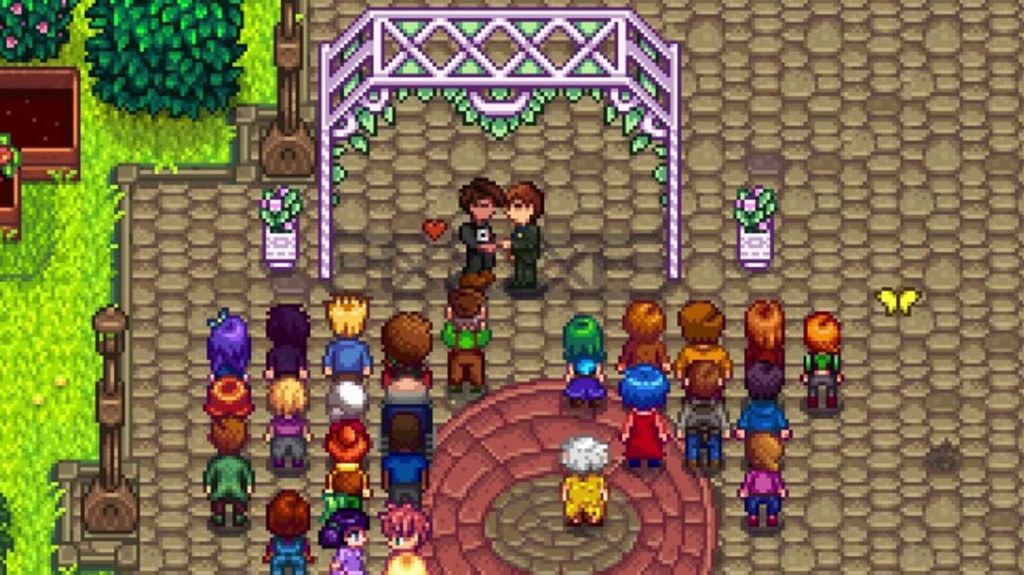 Casamento LGBTQIA+ na praça de Stardew Valley, com os moradores participando da cerimônia